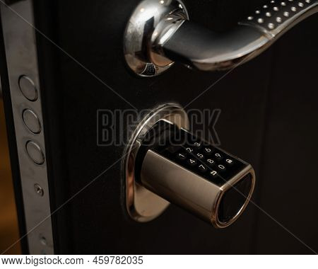 Open Door To The Apartment With A Combination Lock. Keyless Entry.