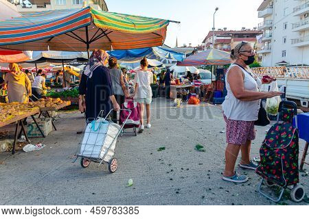 Bazaar In The Turkish City Near Alanya, People Buy Groceries, Vegetables, Fruits