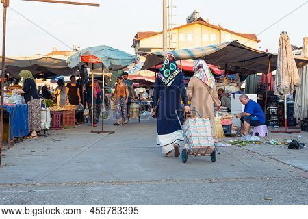 Bazaar In The Turkish City Near Alanya, People Buy Groceries, Vegetables, Fruits