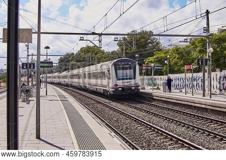 Sitges, Spain 16 07 2022: The Catalan Suburban Train In The Concept Of Free Tickets By The Governmen