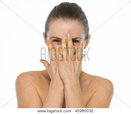 Beauty Portrait Of Young Woman Hiding Behind Hands