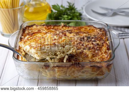 Pasta Casserole Bechamel Sauce Topped With Melted Mozzarella Cheese And Served In A White Baking Dis