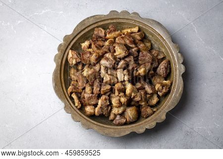 Muslims Traditional Sacrifice Holiday Food Lamb, Turkish Roasted Meat In Copper Pot On Table Top. Tu