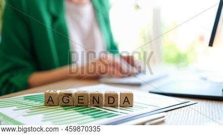 Close-up Of Agenda Word Collected With Wooden Blocks In Row. Business Of Day, Time Management Planni
