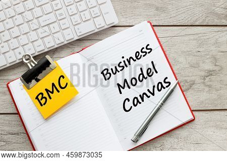 Bmc Business Model Canvas Symbol. Concept Words Bmc Business Model Canvas. Office Desk, Open Red Not