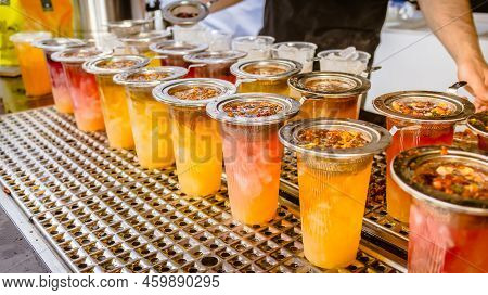 Preparing Fresh Brewed Ice Tea. Street Food And Refreshment