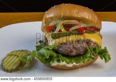 Cheese Burger  Served With Sauteed Onions And Peppers,