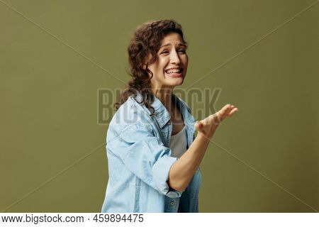 Irritated Angry Screaming Curly Female In Jeans Casual Shirt Quarrel With Husband Posing Isolated On