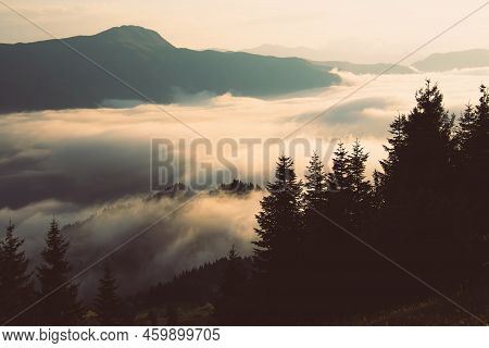 Dramatic Sunset Over Clouds In Adjara Region With Clouds Pass And Sun Over Horizon .stunning Vibrant