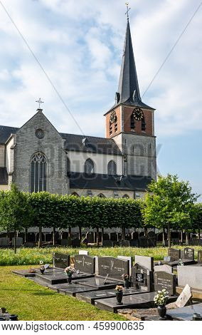 Lier, Antwerp Province, Belgium - 07 08 2022 - Graveyard And Catholic Church Of The Village