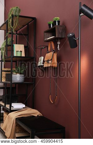 Modern Hallway Interior With Stylish Furniture And Key Holder