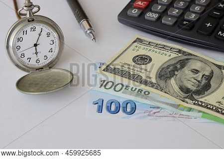 Dollar, Eruo And Turkish Lira With A Calculator And A Pen