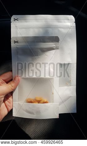 This Is Photo Of White Paper Pack For Wrapping Food.