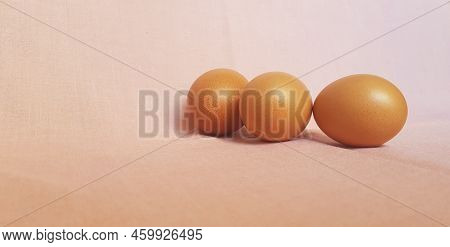 A Few Eggs On A Pink Cloth.