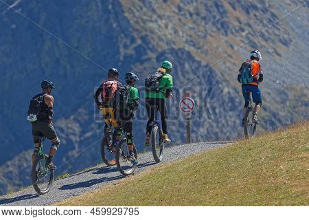 Chamrousse, France, August 1, 2022 : A Group Of Unicycle Practitioners Train On The Paths Of The Cro