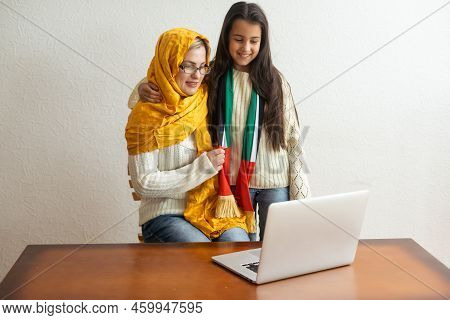 Middle Eastern Family With Traditional Emirates Dresses Posing In A Photographic Studio - Concepts A