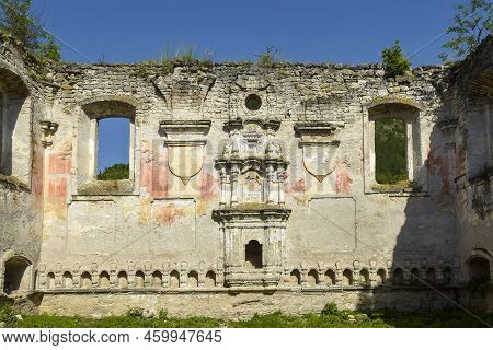 Ruins Of An Ancient Synagogue Shabtai Rabbi With Arched Windows, Against Blue Sky. Texture Old Dilap