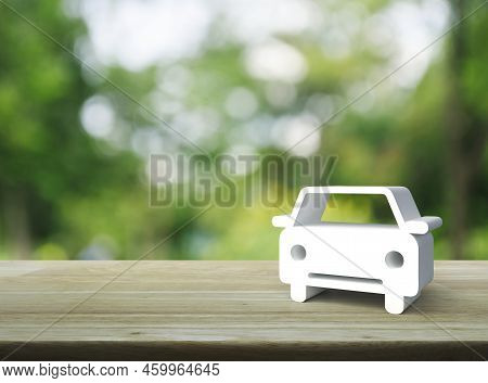 Car 3d Icon On Wooden Table Over Blur Green Tree In Park, Business Transportation Service Concept