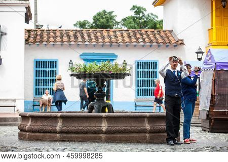 Medellin, Colombia - November, 2017: Tourists Taking Pictures And Video At The Pueblito Paisa In Med