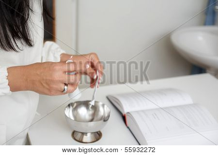 Pharmacist Prepare Mixture In Mortar