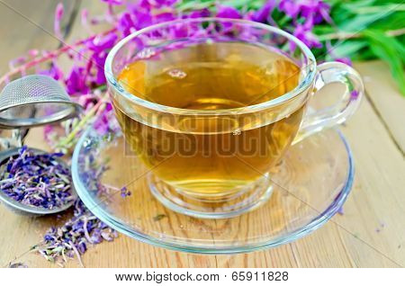 Herbal Tea From Fireweed In Cup With Strainer