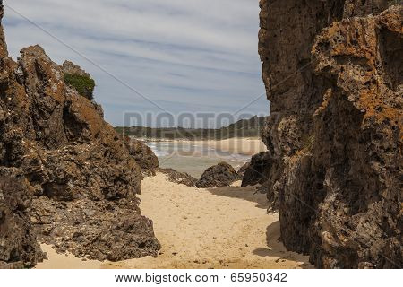 Rocks And Beach At Mullimbura Point Near Bingi. Nsw. Australia.