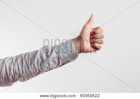 thumbs up of young man