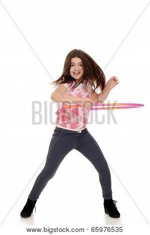 child doing hula hoop with motion blur