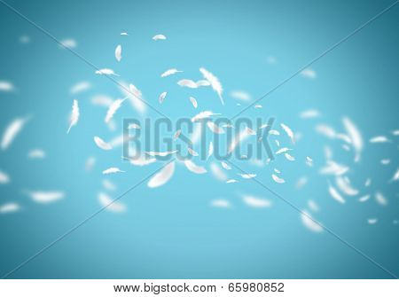 Abstract background image of feathers flying in air