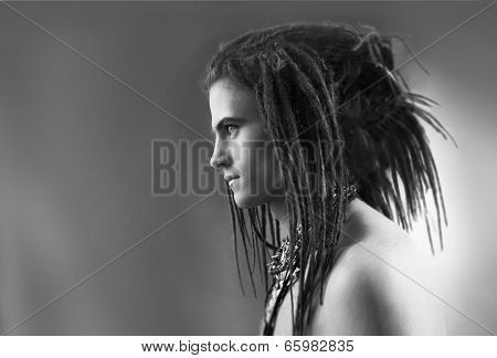Black And White Profile Portrait Of A Young Man With Dreadlocks