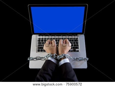 Hands Of Businessman Addicted To Work Bond With Chain To Computer Laptop In Workaholic