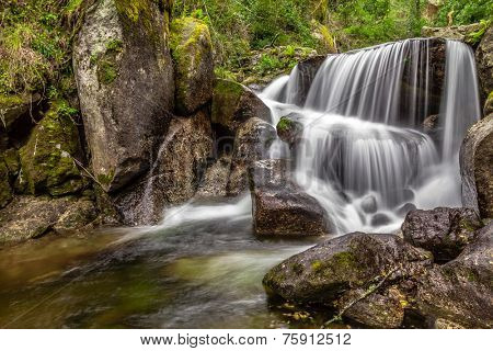 Waterfall during the autumn near the Queimadela Dam in the Municipality of Fafe. Portugal