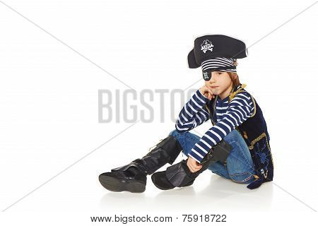 Grinning little boy pirate