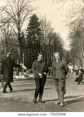 POLANICA ZDROJ, POLAND, CIRCA FEBRUARY 1966 - Vintage photo of women in park