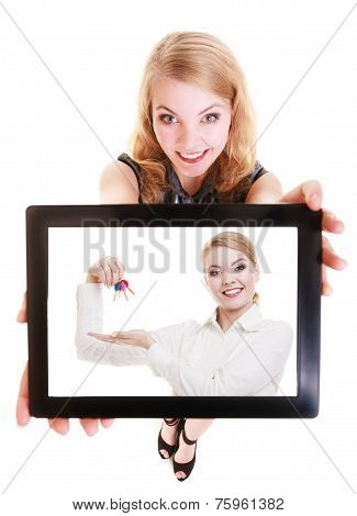 Real Estate Agent Woman Showing Keys On Tablet.