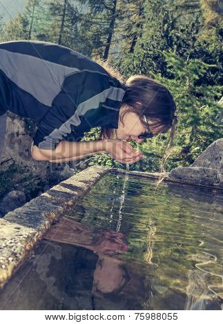 Young Girl Drinking Water