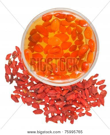 Above View Of Goji Berries Infusion And Fruits