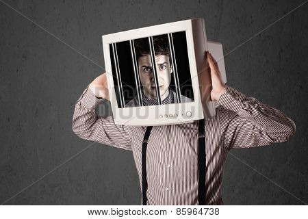 Business man with monitor screen on his head traped into a digital system concept