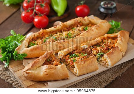 Turkish pide traditional food with beef and vegetables