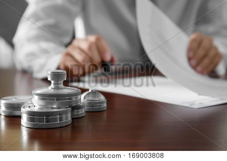 Metal ink pads and stamp on notary public table