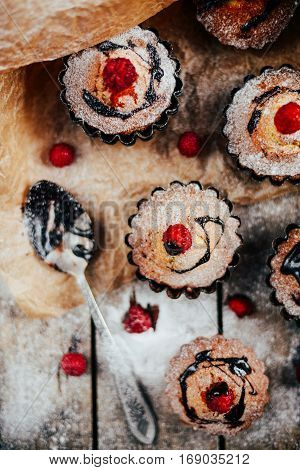 Delicious Chocolate Cupcakes With Berries On Wodeen Table, Top V