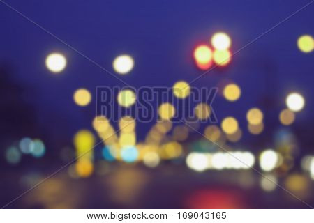 Bokeh traffic light on the road for background