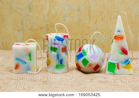 Handmade Candles In The Shape Of A Pyramid, Cube, Cylinder And Sphere