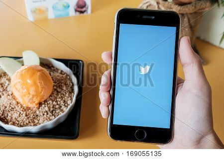 CHIANGMAI THAILAND -JAN 72017:Iphone 6s open Twitter app.Twitter is an online social networking and microblogging service that enables users to send and read 