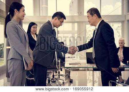 Business Partners Introductionary Handshake Bow