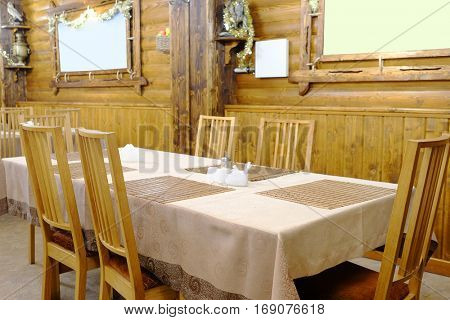 Interior of a cafe in a wooden house