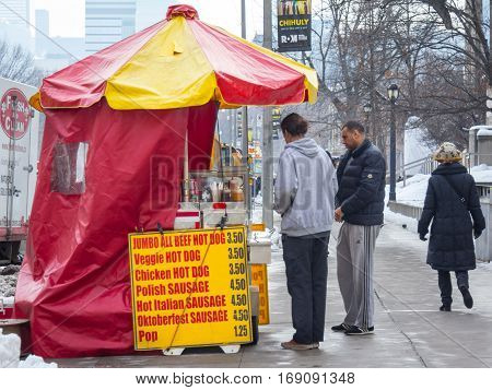 TORONTO, CANADA - DECEMBER 29, 2016: Traditional North American hot dog stand in Downtown Toronto, Canada