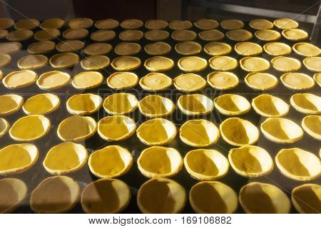 Tart for the Portuguese dessert Pastel de nata. Production of Pastel de nata