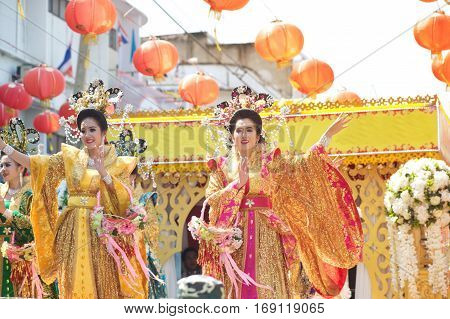 NAKHONSAWAN,THAILAND - JANUARY 1,2017 : Group of Unidentified pretty woman is Fairy performing and dance during the Chinese New Year Parade into city in Nakhonsawan Province,Middle of Thailand.