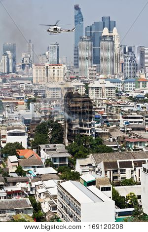 Bangkok, Thailand - February 05, 2015 Fire in a ten-storey building in Bangkok Yannawa district